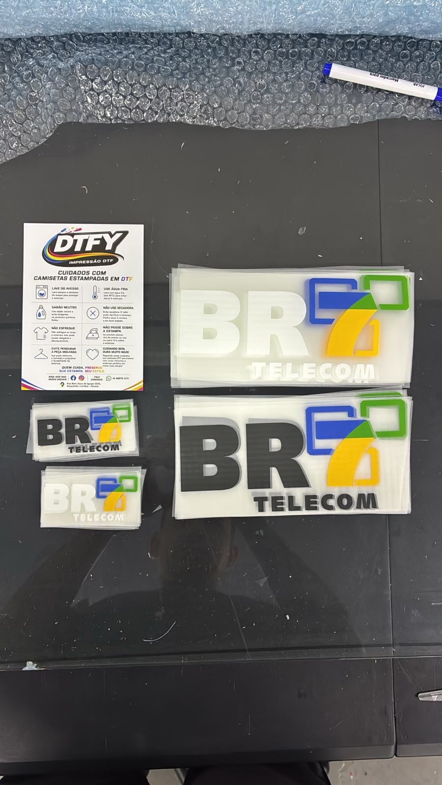 Pedido real de transfers DTF entregue pela DTFY