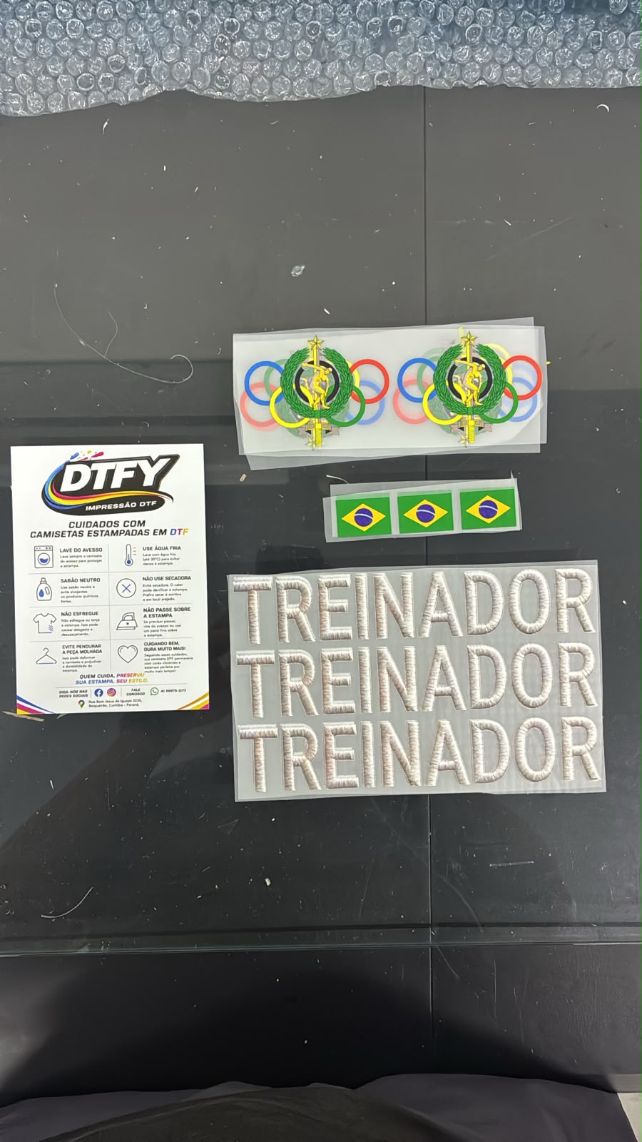 Pedido real de transfers DTF entregue pela DTFY